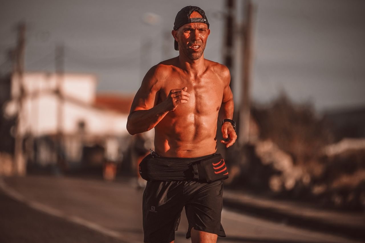 A man exercising outdoors, one of the pillars of everyday vitality